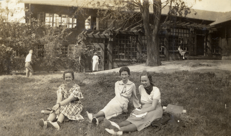 ladies sitting on lawn