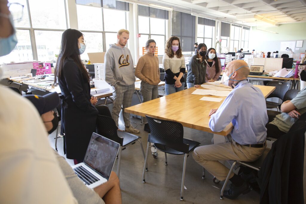 students gathered around a table