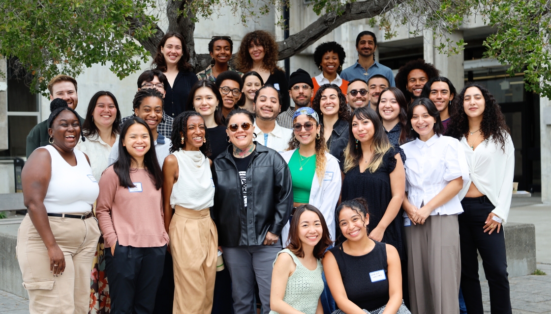 Arcus Social Justice Corps Fellows smiling in front of Bauer Wurster Hall