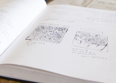 Open sketchbook with garden drawings