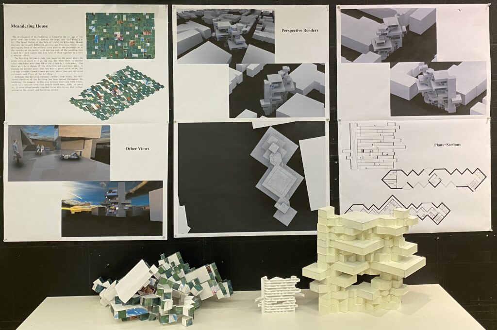 Three paper-based 3D models in front, architectural designs pinned on wall in back