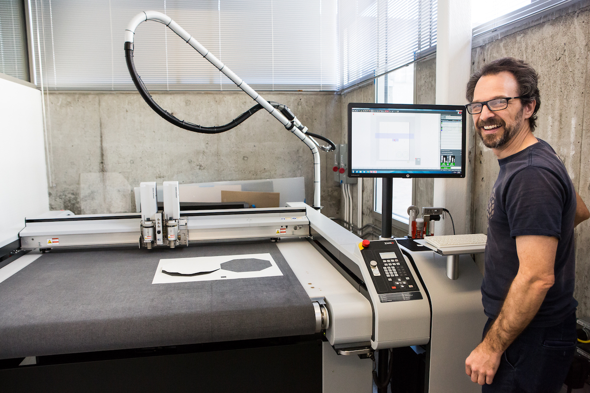 A man in CED's Fabrication Lab