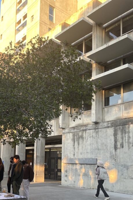 a group of people outside of a building