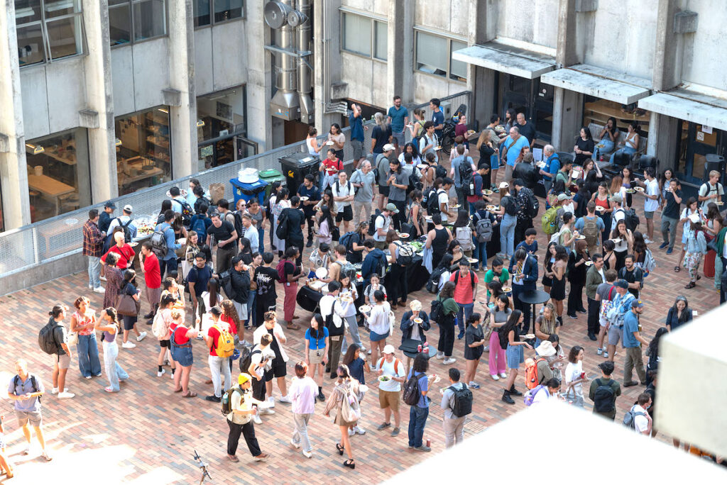 Crowd of people in courtyard shot from above