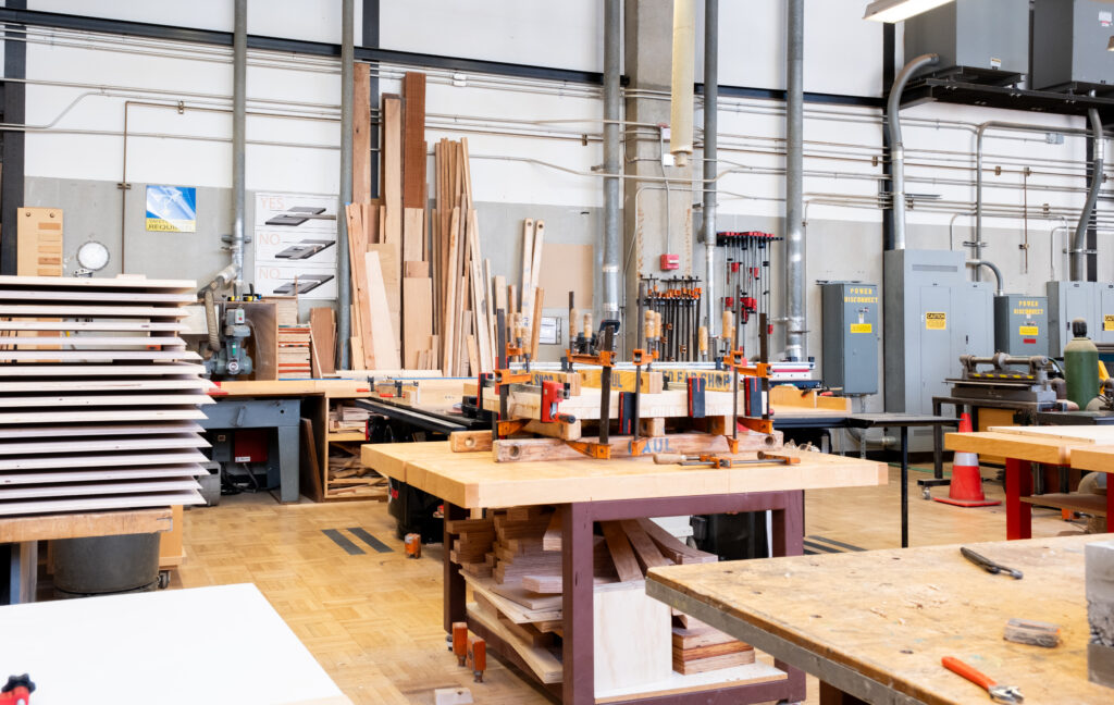 a woodworking shop with many wood pieces