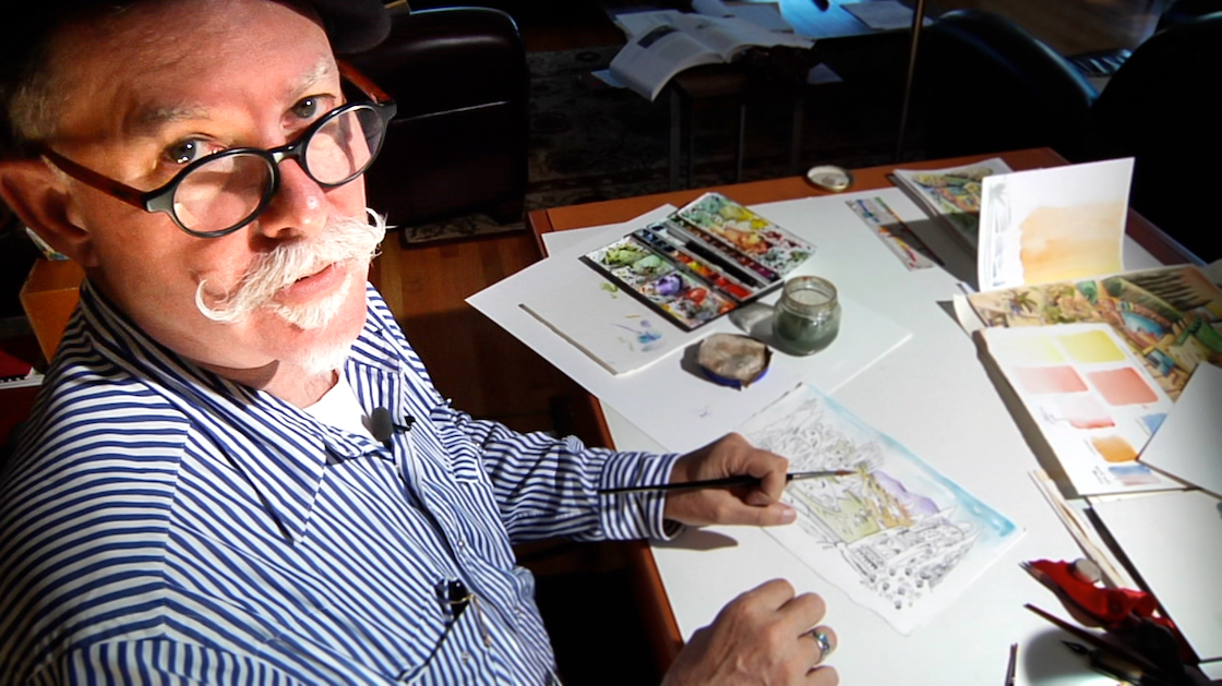 Landscape architecture professor Chip Sullivan at his drawing table