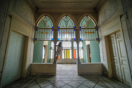 Photo of interior of a Lebanese house featuring triple arches