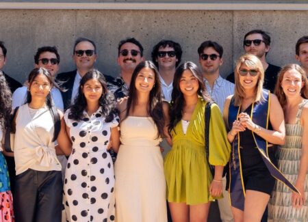 Berkeley's MRED+D 2025 cohort smiling for group photo after graduation