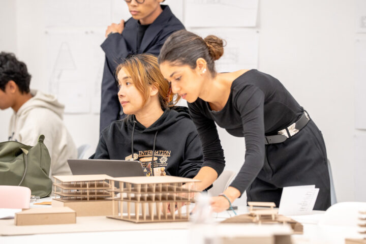 Students with architectural models