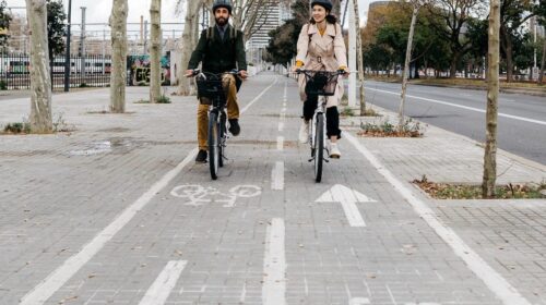 Cyclists riding in bike lane