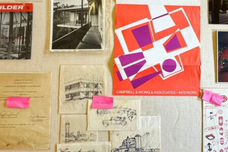 Drawing and photos pinned to a display board during installation of Modern Vernacular: Asian American Architects and the Built Environment of Postwar Northern California