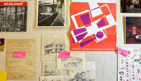Drawing and photos pinned to a display board during installation of Modern Vernacular: Asian American Architects and the Built Environment of Postwar Northern California